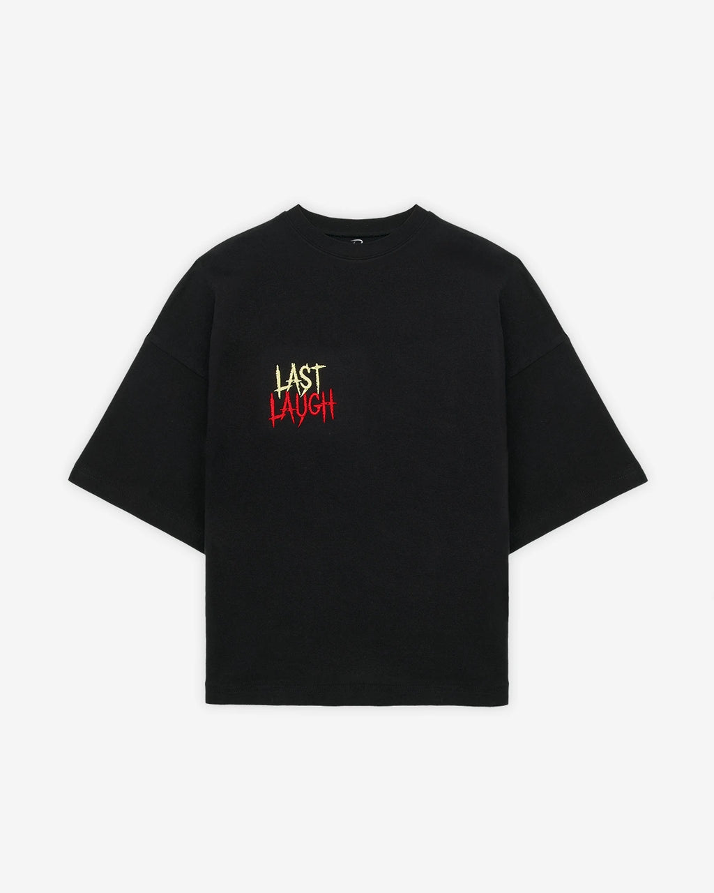 Flat lay view of a Black cropped oversized heavyweight t-shirt with LAST LAUGH text embroidered in on the chest, laid flat against a clean white background.